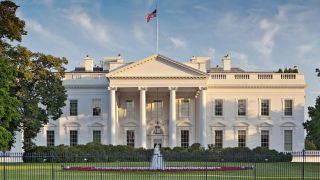 White House with U.S. Flag