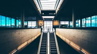 media Airport Infrastructure: Escalators inside gate FAA Modernize